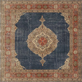 The Antique Symphony - Washable Rug (JRN1017) features a square shape, navy blue field, cream and red medallion, intricate florals, and a wide red-beige border—ideal for adding elegance to traditional spaces.