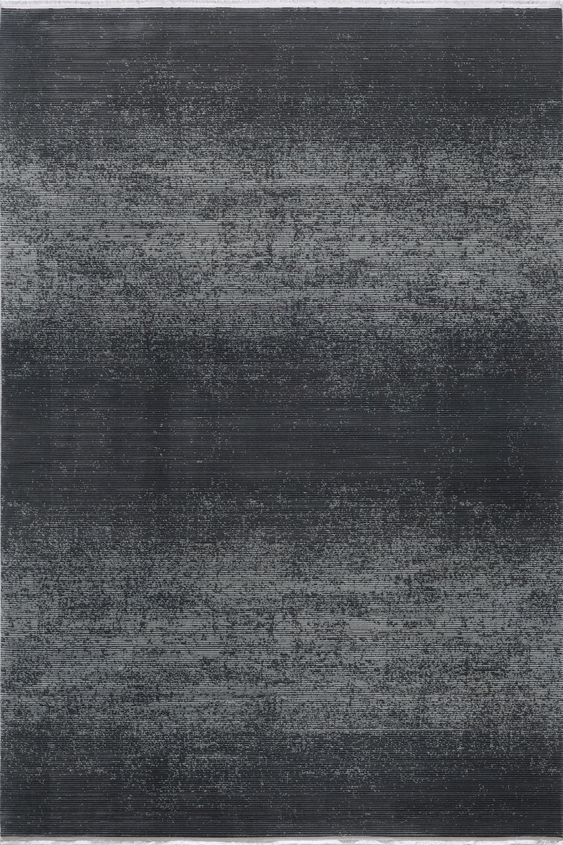 The Antrachite Shadows Black Rug - M497A is a modern rectangular area rug with a dark gray and black gradient, featuring subtle horizontal lines and a slightly distressed, textured pattern.