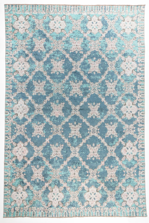 Bild 1 in Galerieansicht laden. Ocean Trellis area rug with deep teal blue field and ivory lattice pattern with distressed floral motifs