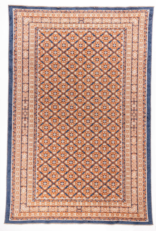 Bild 1 in Galerieansicht laden. Spice Lattice area rug with rust orange field, cream diamond lattice pattern, and navy blue triple border