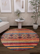 The Arctic Chill - Washable Rug - JR860 (Custom Size) adds vibrant stripes and color, brightening dark wood floors beside a light sofa, side table with flowers, potted plant, and framed art—ideal for high-traffic areas.