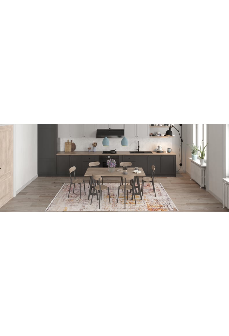 Modern kitchen and dining area featuring a large wooden table with six chairs, pendant lights, dark lower cabinets, white upper cabinets, a flower vase centerpiece, and the Artistic Abstraction - Washable Rug - JR775 (Custom Size).