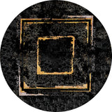 The Azure Glow - Washable Rug - JR1337 is a circular black rug with a distressed look, featuring two gold square frames and subtle floral patterns—durable for high-traffic spaces and conveniently washable.