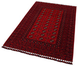 The Berry Pattern - Kilim - BHR04 is a rectangular red Turkish rug featuring an intricate geometric design, repeating motifs, detailed borders, and tasseled fringe on the short sides. This machine-made rug combines beauty with durability.