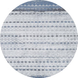 The Bohemian Reverie - Washable Rug - JR1974 features a circular shape with horizontal stripes and diamond patterns in blue and gray on white. This geometric, modern rug is ideal for high-traffic areas and easy to clean.