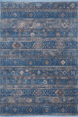 The Bohemian Tracery Rug - Blue - 2221B features a rectangular design with a blue background and detailed geometric and floral patterns in beige, brown, and white, arranged in horizontal rows.