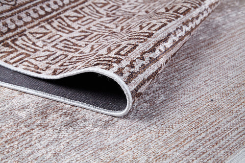 Load image 1 in gallery view. A close-up of the Bohemian Treasure - Washable Rug - JR1586 (Custom Size) shows its textured brown and beige geometric design with a dark non-slip backing, perfect for high-traffic spaces and resting on a matching woven floor.