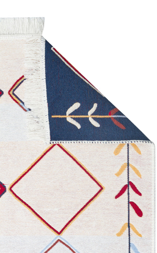 Load image 1 in gallery view. A close-up of the Boho Charm - Washable Reversible Kilims - AR21 shows geometric diamonds and leaf motifs in red, yellow, and blue on a cream background, plus fringe along the edge.
