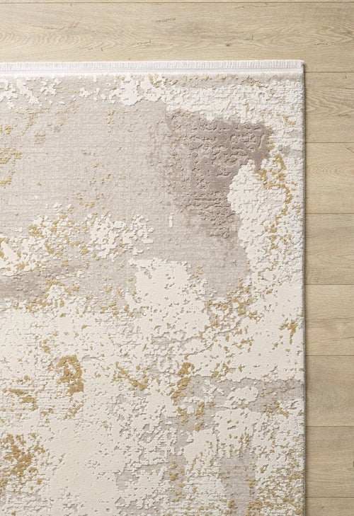 Load image 1 in gallery view. The Bright Swirls Contemporary Rug - M657F features an abstract cream, beige, taupe, and gold pattern with a white border and painterly texture, displayed on a light wooden floor. Its machine-made design adds a modern touch to any space.