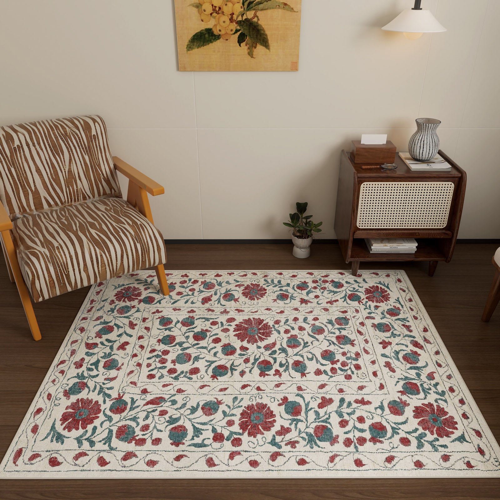 Living room with a floral patterned rug, armchair, and side table.