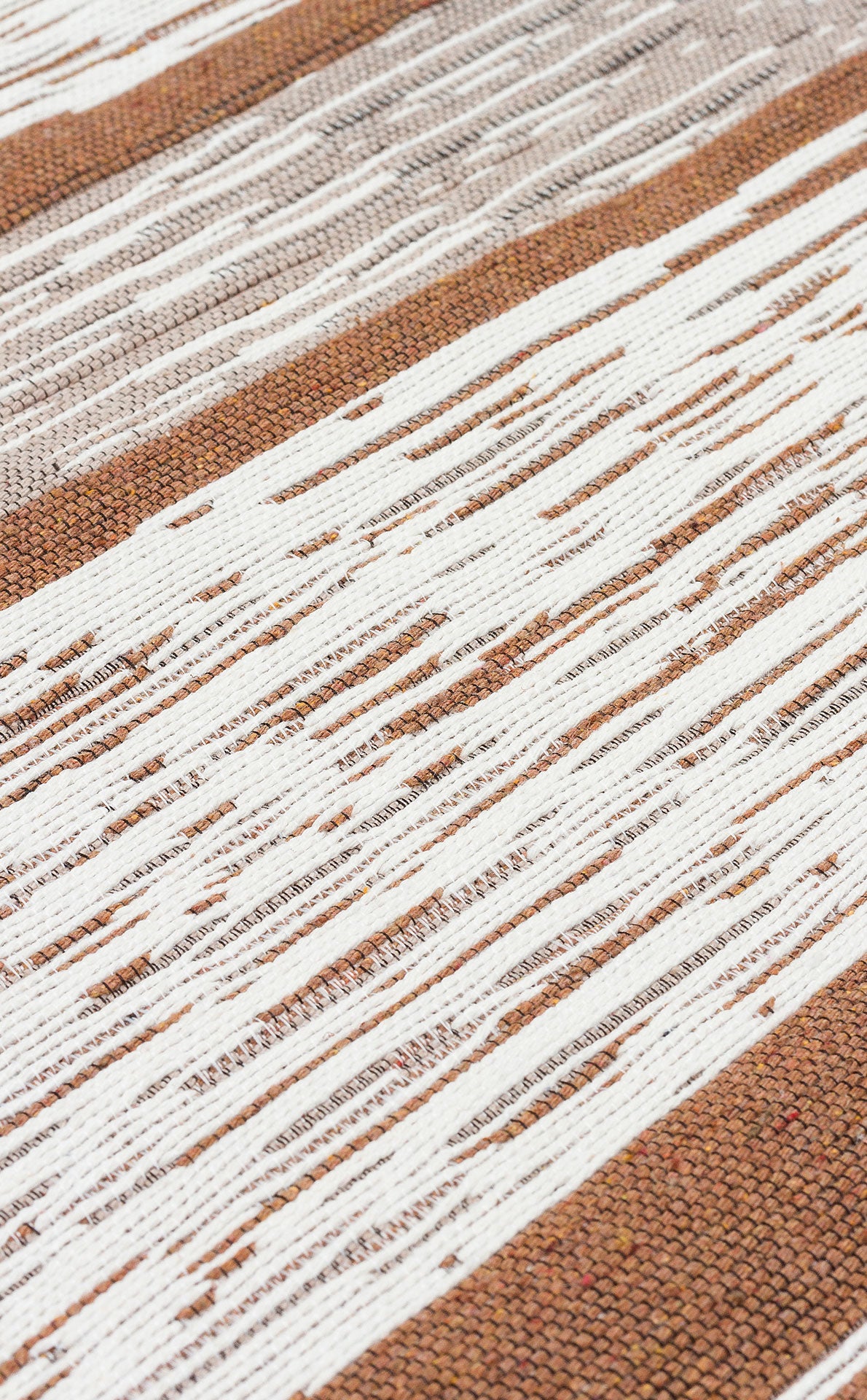 A close-up of Calm Thread - Washable Double-Sided Kilims - AR27 shows alternating brown and white stripes. Loosely woven, uneven white threads evoke a rustic cream kilim rug, enhancing the textured look.