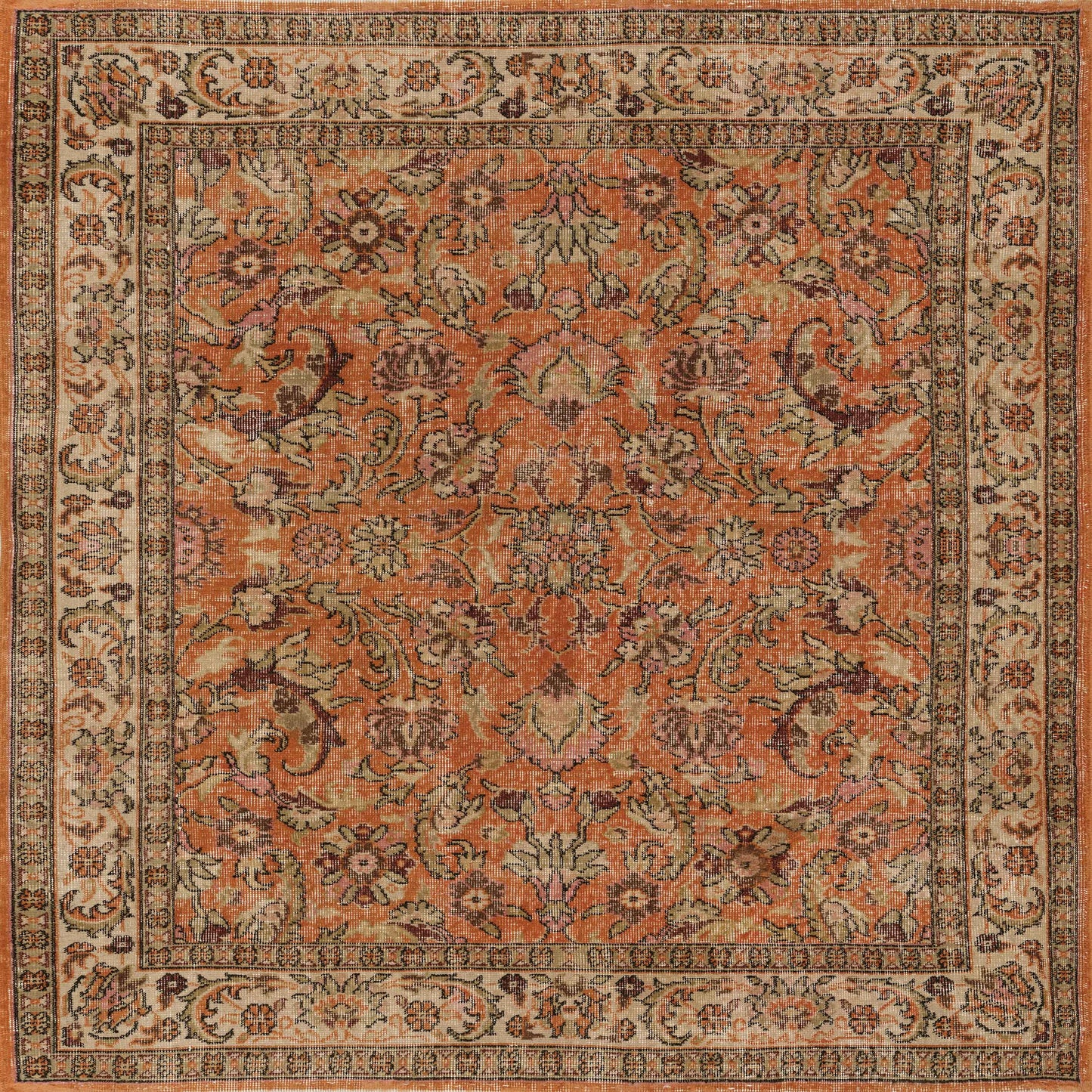 The Celestial Vintage - Washable Rug - JRN1020 is a rectangular orange rug featuring an ornate floral and vine pattern in orange, beige, brown, and green, bordered by a detailed cream and brown floral design.