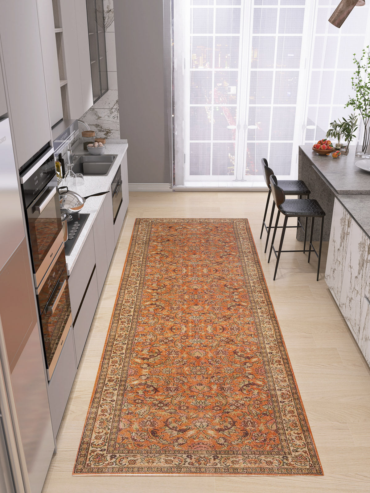 A modern kitchen features light cabinets, stainless steel appliances, and a custom-size Celestial Vintage - Washable Rug - JRN1020 with orange accents on light wood floors. Large windows brighten the space, and two bar stools sit at a gray countertop.