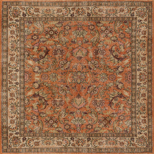 Load image 1 in gallery view. The Celestial Vintage - Washable Rug - JRN1020 (Custom Size) is an ornate rectangular rug with intricate floral and vine patterns in orange, beige, cream, and brown, accented by a decorative border.