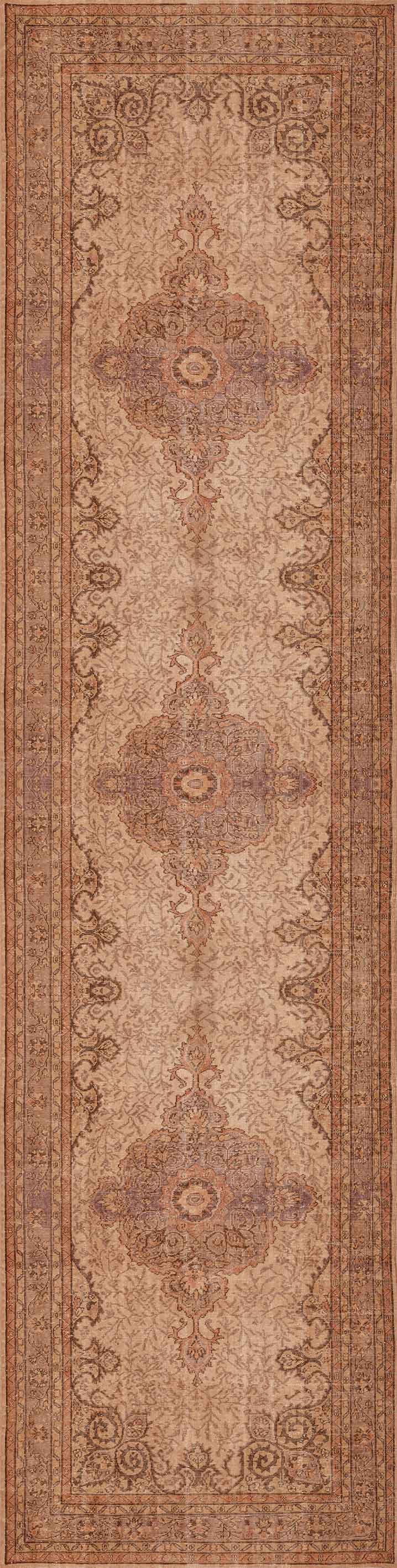 The Chateau Elegance - Washable Rug - JRN1018 features a long, rectangular medallion design with ornate, symmetrical patterns in muted brown, beige, and rust for a classic vintage look that enhances any room.