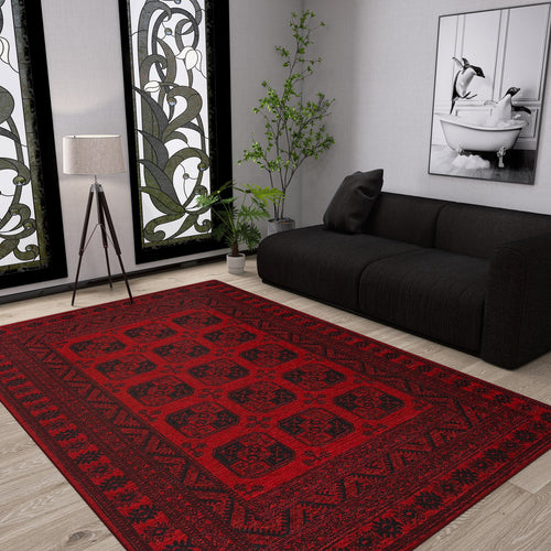 Load image 1 in gallery view. A modern living room with a dark sofa, the Cherry Texture - Washable Kilim - BHR01 in red, a floor lamp, potted plant, wall art of a person in a bathtub, and large windows with decorative glass panels letting in light.