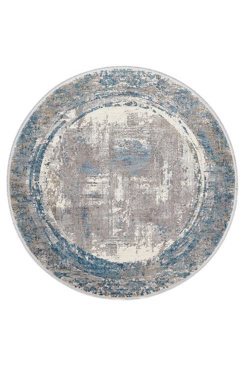 Load image 1 in gallery view. The ChromaBurst Premium Rug - Blue - MT176 is a round machine-made rug with a distressed abstract pattern in blue, gray, beige, and cream, featuring a faded circular motif and textured look for modern style.