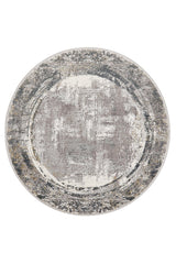 The ChromaBurst Premium Rug - Dark - MT175 is a round, machine-made rug featuring a distressed abstract pattern in gray, beige, and off-white with textured details and a subtle border—ideal for bringing modern style to any space.