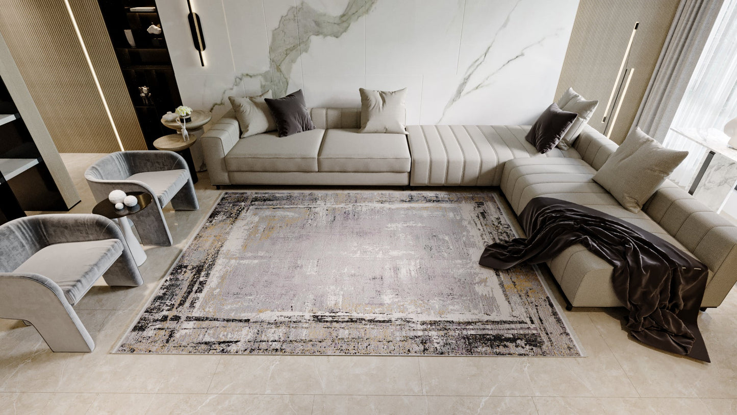 A modern living room with beige sectional sofas, gray armchairs, the ChromaBurst Premium Rug - Dark - MT175, marble accent wall, and floor-to-ceiling windows flooding the space with natural light.