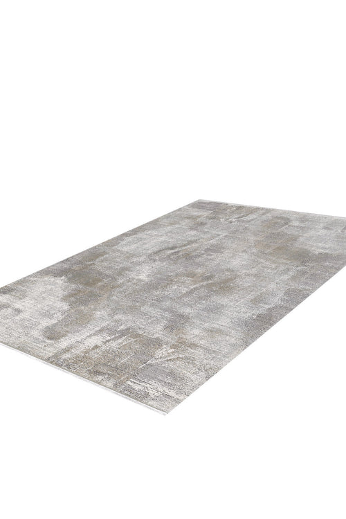 Load image 1 in gallery view. The Chromatic Flair Contemporary Rug - Latte - M660D is a machine-made rectangular rug with a subtle abstract gray and beige pattern, showcased on a white background.