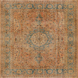 The Classic Laurel - Washable Rug (JRN1022) features an ornate central medallion, floral and vine motifs, and a decorative border in gold, blue, and coral on cream beige, all with a slightly faded vintage look.