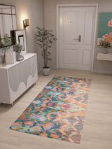 The Classic Motif - Washable Rug - JRN29, featuring abstract geometric patterns in bright colors, adds style to a light wood hallway with white walls and modern decor—ideal for high-traffic areas.