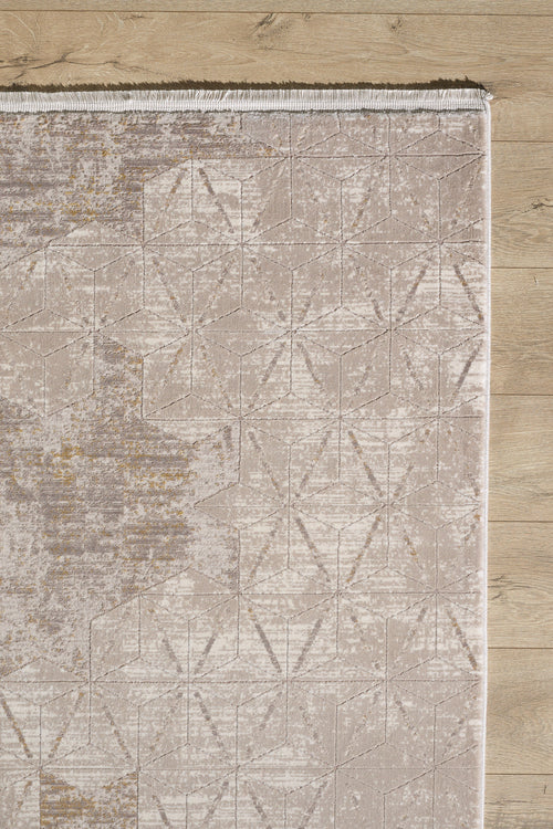 Load image 1 in gallery view. The Cloudscape Geometry Modern Rug - M533B features a beige and light brown geometric pattern with a subtle design. Shown here on a light wood floor, only the upper left section is visible, displaying tasseled edges at the top.