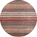 The Coastal Breeze - Washable Rug - JR1549 is a round rug with earthy horizontal stripes and geometric patterns in brown, bronze, orange, beige, and dark gray—perfect for allergy-sensitive homes.