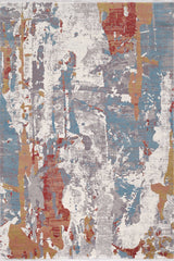 The Colorful Chaos Premium Rug - M313P boasts a splattered paint design in white, blue, red, yellow, and gray. Machine-made for durability, it adds a modern artistic touch with its layered, textured patterns.