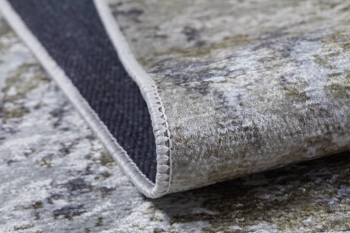 A close-up of the Contemporary Canvas - Washable Rug - JR145 (Custom Size) in yellow-gold, showing fine edge stitching and dark backing—durable and ideal for high-traffic areas.
