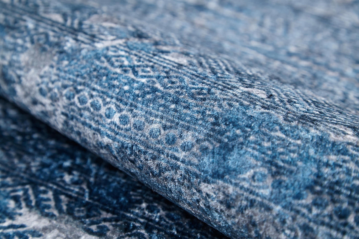 Close-up of the Contemporary Serenity - Machine-Washable Rug JR1884 (Custom Size), featuring blue tones with white geometric and textured designs, perfect for high-traffic areas.