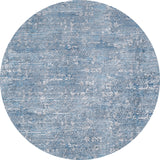 The Contemporary Serenity - Machine-Washable Rug JR1884 (Custom Size) features a round blue design with a distressed, textured blue and white pattern, giving any high-traffic area a vintage look while being easy to clean.