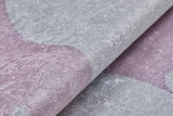 Close-up of the Cosmic Naptime - Machine-Washable Rug JRC032 (Custom Size) featuring a soft, velvety texture in light lavender and pale gray, with gentle folds and an abstract pattern reminiscent of flat weave washable rugs.