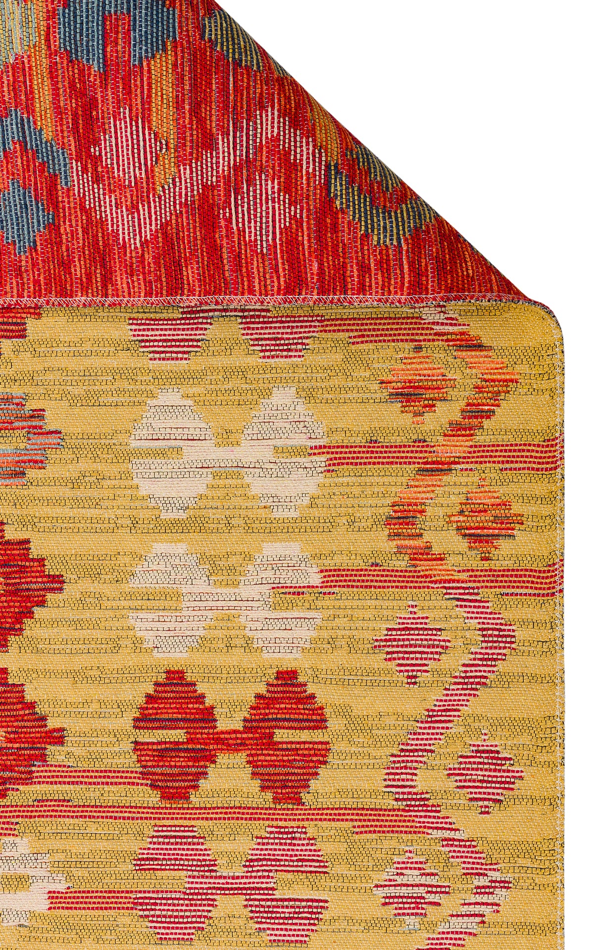 Crimson Dot - Kilim - NMD03: A folded woven rug with a yellow base and geometric shapes in red, white, and beige. The turned corner shows an ethnic pattern with striking crimson, blue, and orange diamond and abstract motifs.