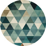 The Cubism Collage Blue Washable Rug - MDJ008 is a round, modern rug featuring a geometric triangle pattern in blue, green, beige, and tan—ideal for high-traffic spaces.