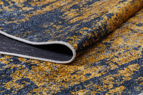 Load image 1 in gallery view. A close-up of the Diagonal Dash - Washable Rug - JR1310 (Custom Size) shows its yellow and black textured pattern, folded corner, and stitched beige edge—ideal as a washable rug for high-traffic areas.