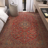 Decorative rug with intricate patterns in a living room setting.