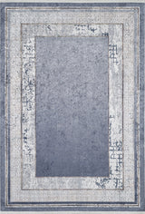 The Dramatic Boundaries - Washable Rug - JR1810 (Custom Size) features a faded blue center with distressed white Greek key borders, offering a vintage look that adds character and durability to high-traffic areas.