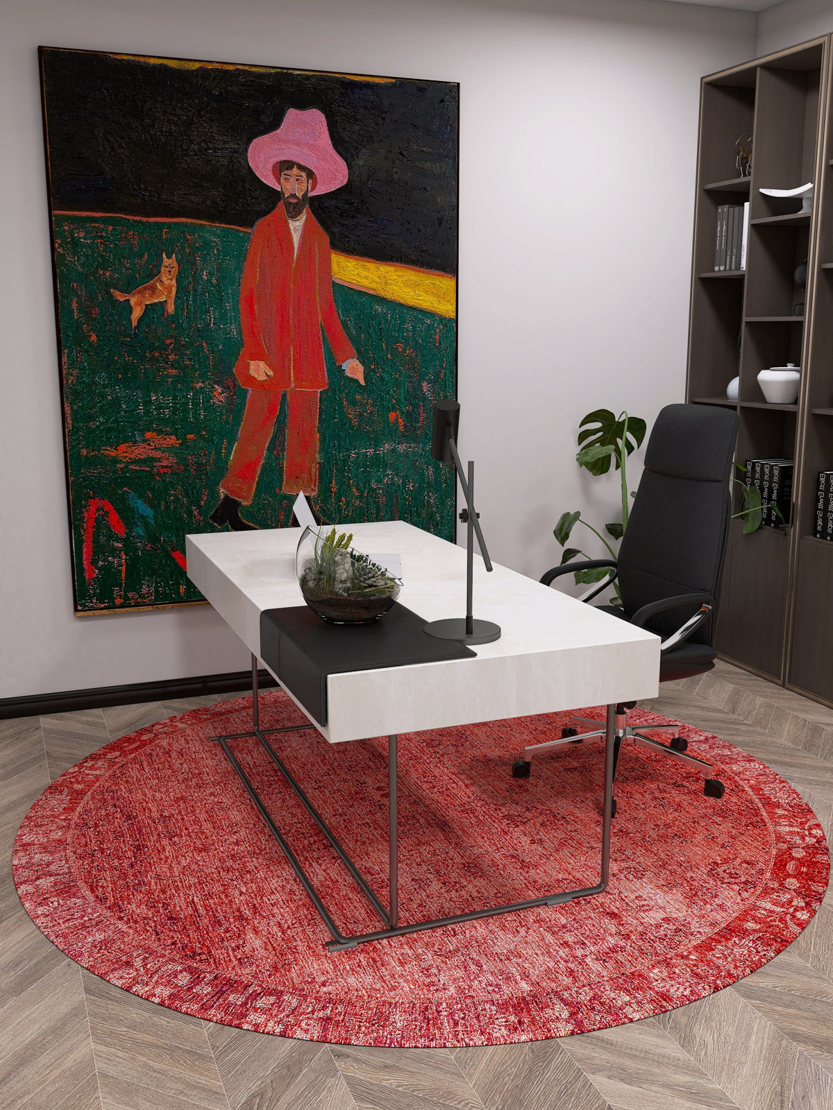 A modern office with a sleek white desk, black chair, and the Dynasty Dream - Washable Rug - JR160 in red. On the wall is a painting of a person in a pink hat and red outfit with a small animal. Shelves and a plant are in the corner.