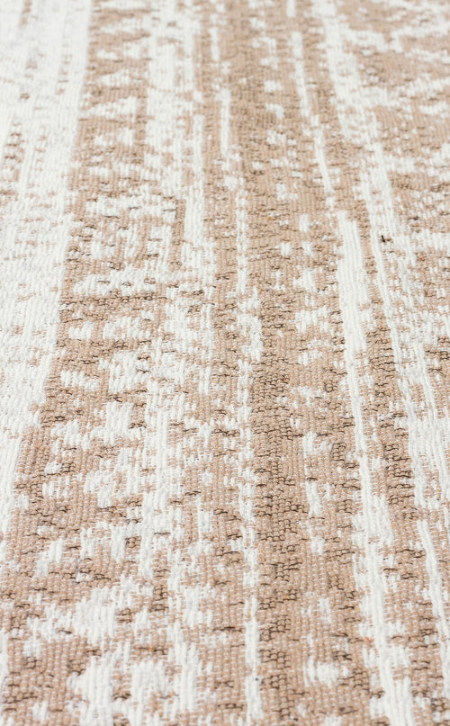 Load image 1 in gallery view. Close-up of the Earth Lines - Washable Double-Sided Kilims - AR06, featuring a beige and white abstract woven pattern with textured, vertical and irregular lines. This allergy-friendly rug is soft, slightly raised, and crafted for comfort.