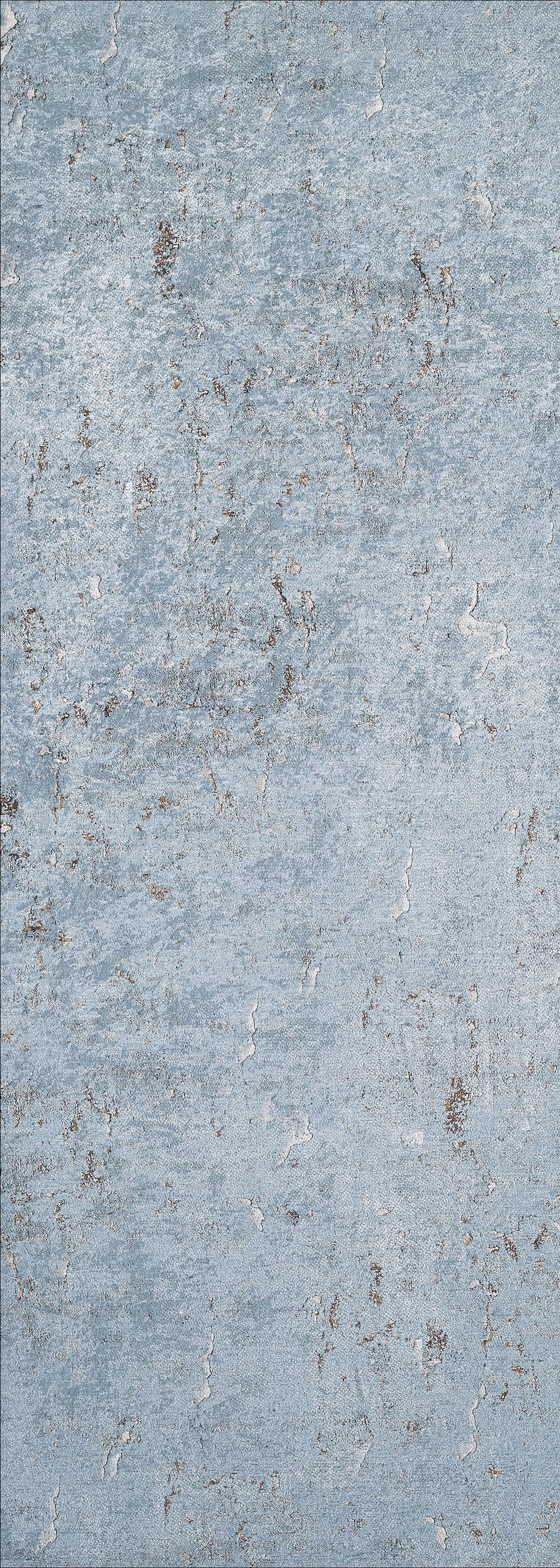 A close-up of the Earthy Sands - Washable Rug - JR1819 shows its textured light blue surface with brown and gray accents, evoking a distressed look ideal for high-traffic areas.
