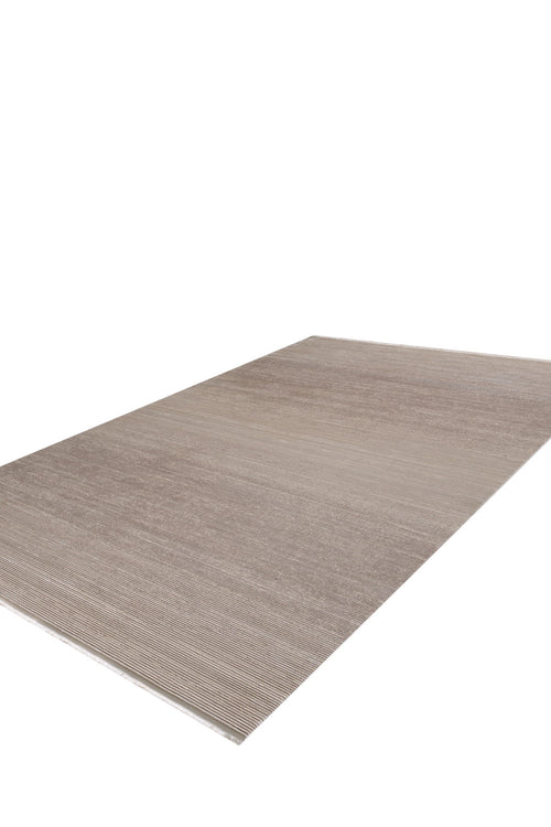 Load image 1 in gallery view. The Earthy Textures Neutral Rug - M497J is a minimalist, machine-made rug in light brown tones with a subtle textured pattern, flat pile, thin profile, and clean edges, displayed on a white background.