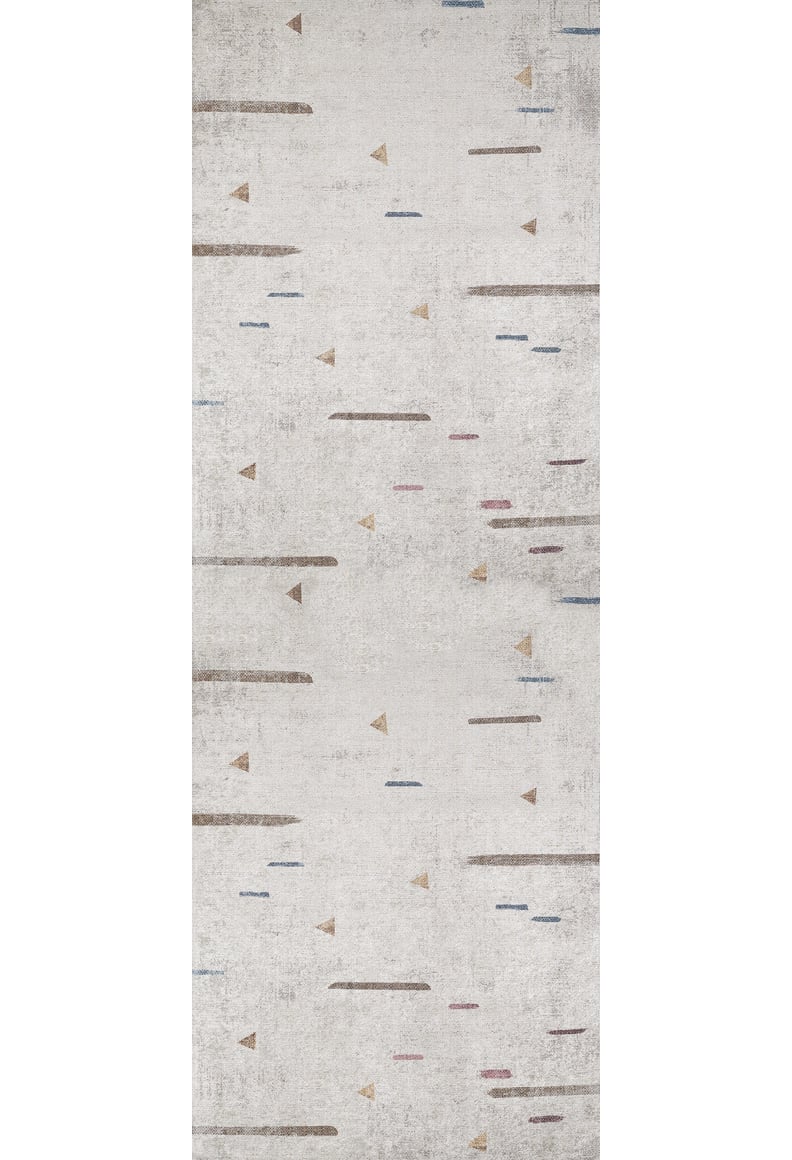 The Ebony Ivory - Washable Rug (JR1994) is a rectangular, easy-care rug with a light gray base, accented by small triangles and lines in muted brown, blue, and rust—ideal for high-traffic spaces and busy homes.