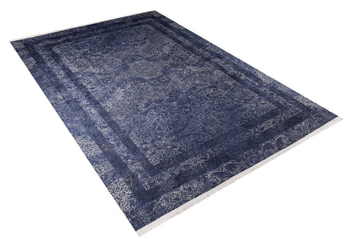 Bild 1 in Galerieansicht laden. The Elegant and Modern - Washable Rug - JR1297 (Custom Size) is a large, rectangular blue rug with intricate floral and geometric patterns, a decorative border, and fringed edges—ideal for high-traffic areas.