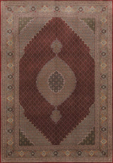The Elysian Weave - Washable Rug (JRN1001) showcases a central medallion with floral and geometric motifs in red, cream, green, and brown. Its wide decorative border and symmetrical, detailed design add elegance to any space.