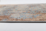A close-up side view of the Enchanted Threads - Washable Rug - JRS002 (Outlet) US shows its flat weave, faded blue and brown pattern, detailed edge, and stitching, all displayed on a white background.