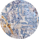 The Enigmatic Elegance - Washable Rug - JR787 features a round shape, blue base, and abstract pattern in blue, beige, gray, yellow, and brown. Its painterly design is textured and ideal for high-traffic areas.