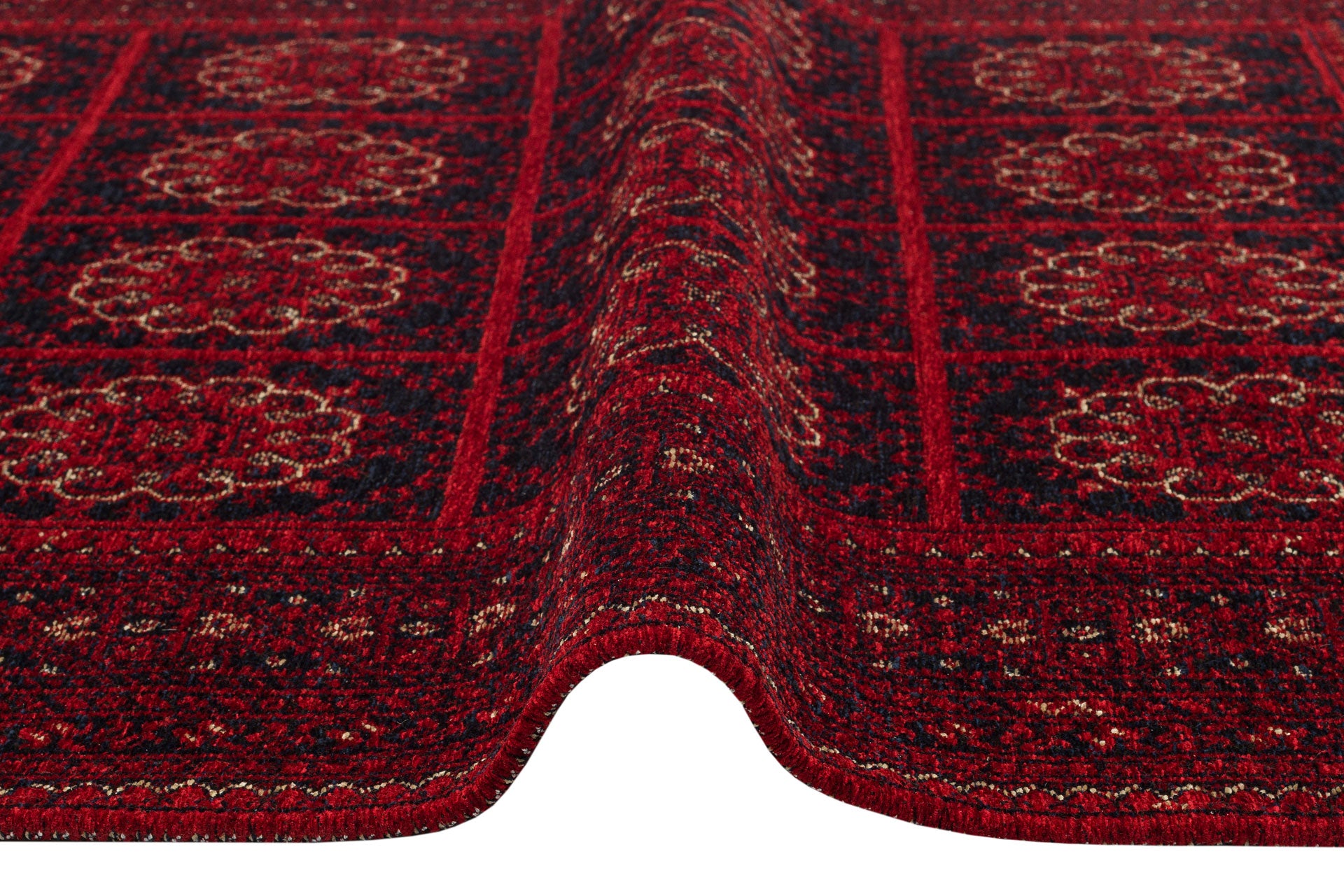 A close-up of the Fire Ripple - Kilim - BHR03 rug reveals red and dark blue patterns, a raised center fold, and intricate geometric and floral designs for elegant Turkish-inspired home decor.