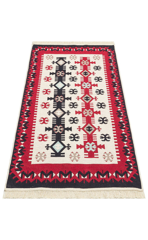 Load image 1 in gallery view. The Flame Line - Washable Reversible Kilims - AR32 is a rectangular tribal geometric rug with a white background, bold black, red, and beige patterns, a striking red and black border, and beige fringe on the shorter sides.
