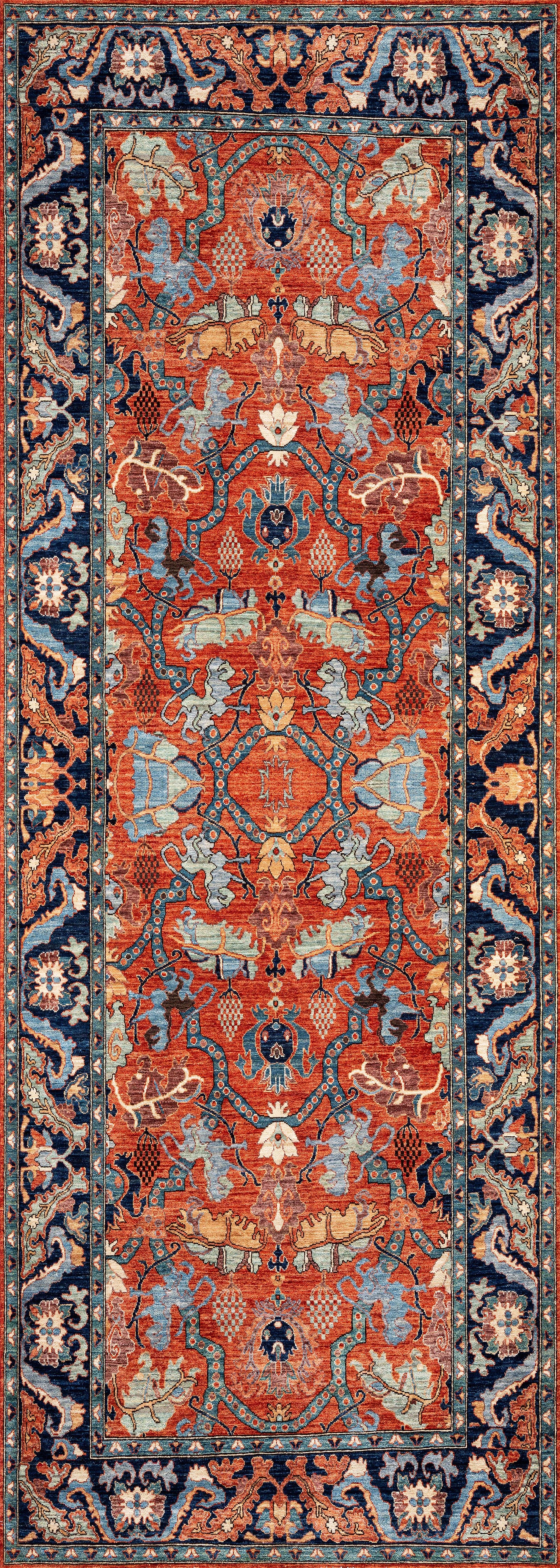 The Galea Turkish-Design Coral Washable Rug (LCC3027) features a Persian-style look with ornate floral and geometric patterns in red, blue, cream, and gold. Its durable, washable design is ideal for high-traffic areas.